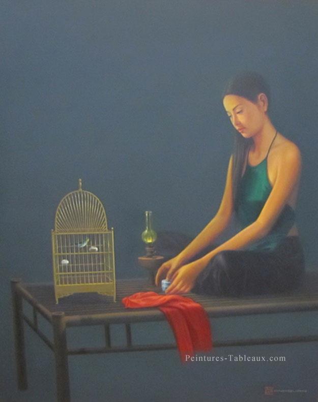 Dame avec birdcage Vietnamien Asiatique Peintures à l'huile